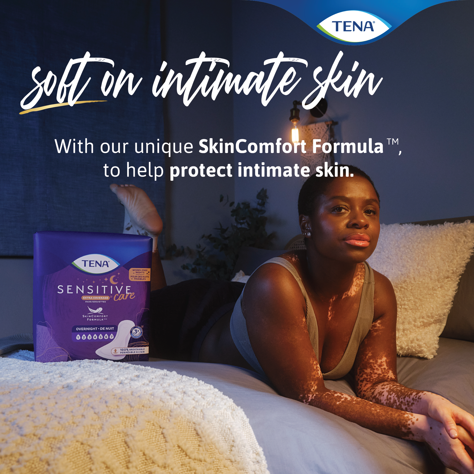 An image shows a woman lying on a bed next to a package of Overnight pads with the words, Soft on Intimate skin