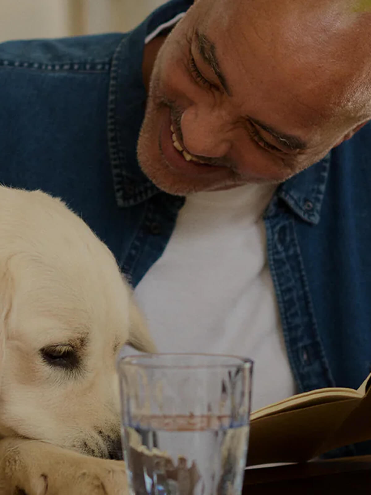 Man and dog sitting together