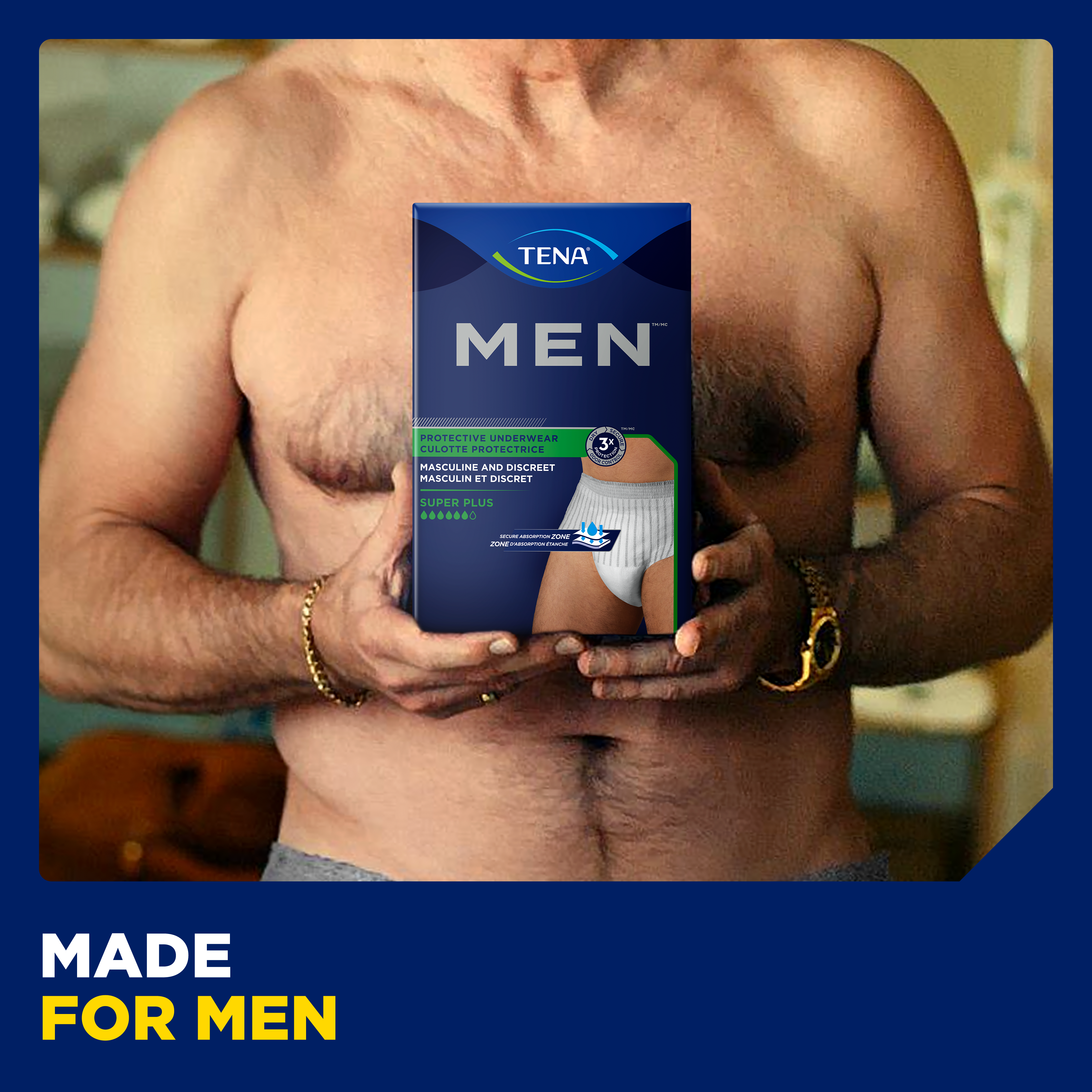 A man holding a package of super plus underwear with words, made for men